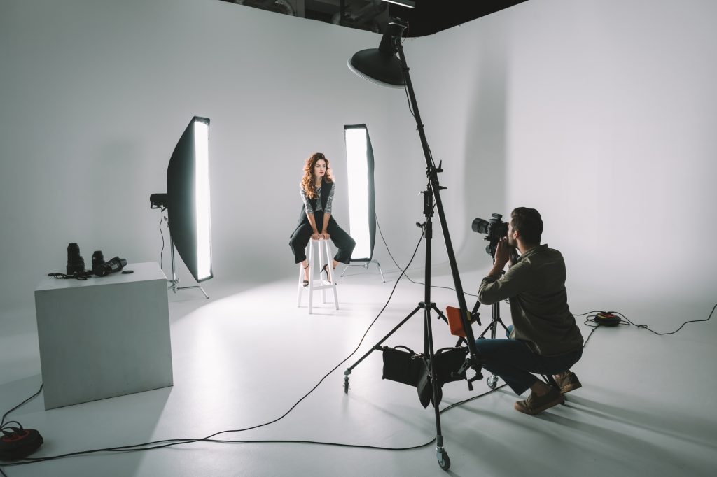 PhotoVibe Studio photography session with a photographer and professional studio equipment